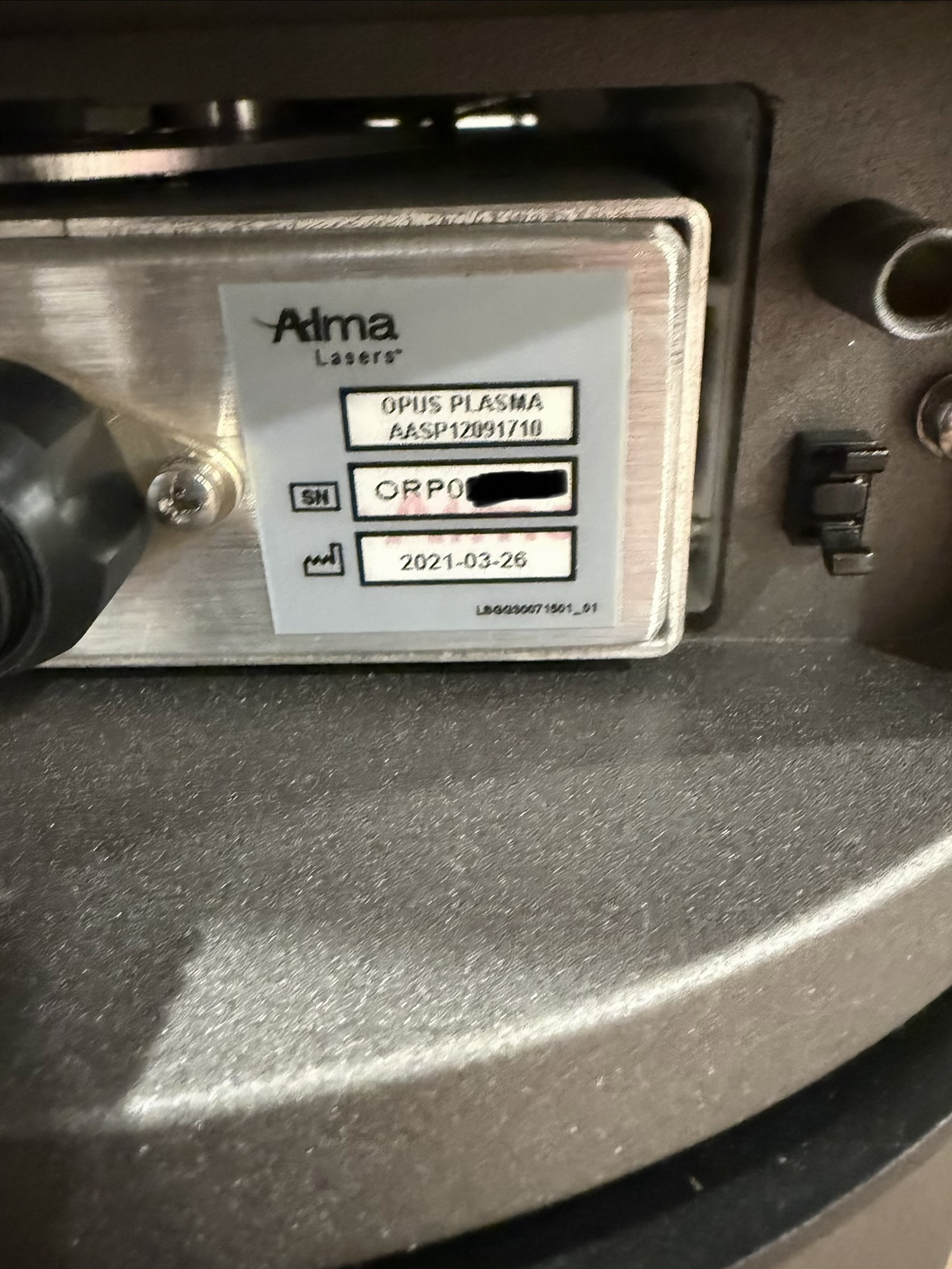 Alma Opus serial number label